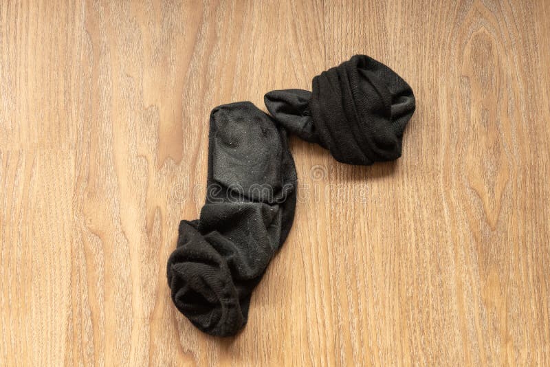 Dirty socks on the floor stock photo. Image of background - 124208474