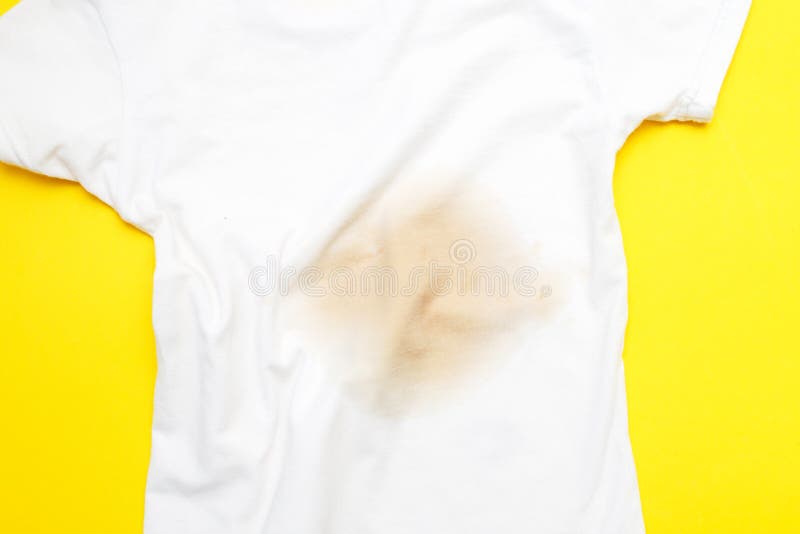 Dirty Stain on a White Clothes on Yellow Background Stock Photo Image