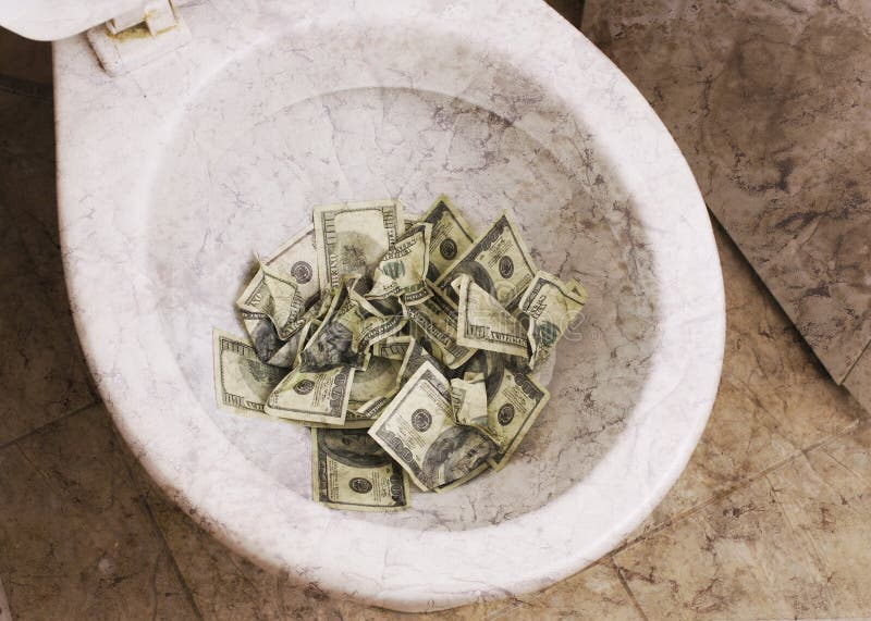 Dirty toilet with money