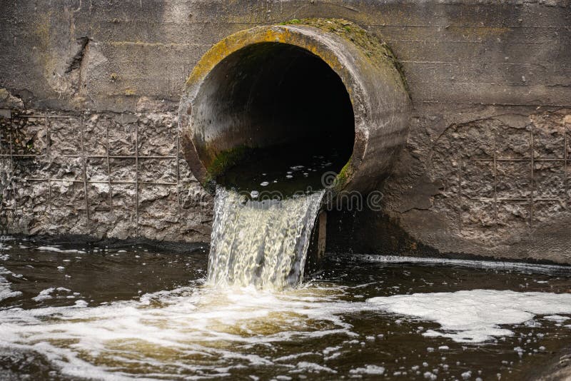 Dirty Water Flows from the Pipe into the River, Environmental Pollution ...