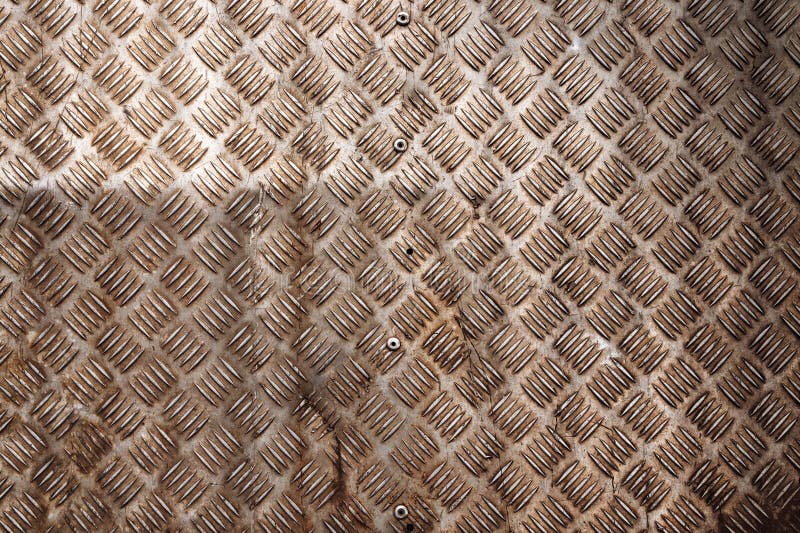 Suprafață metalică antiderapantă metalică purtată și rezistentă, ca fond mormăit royalty free stock photos