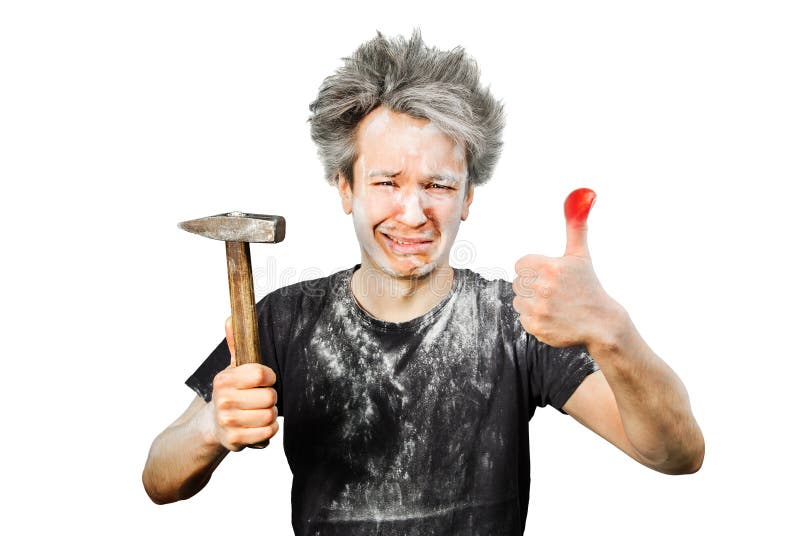 Dirty young builder guy fail is hold a hammer, hit the finger on a white  background at home during repairs