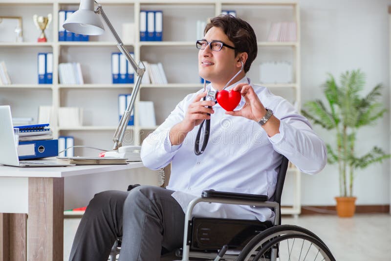 The Disabled Doctor on Wheelchair Working in Hospital Stock Image