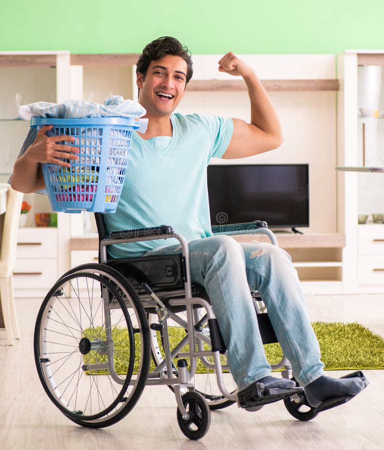 Disabled Man on Wheelchair Doing Laundry Stock Image Image of