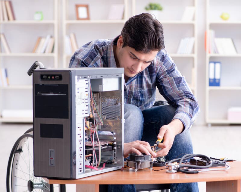 Disabled Man on Wheelchair Repairing Computer Stock Photo - Image of ...