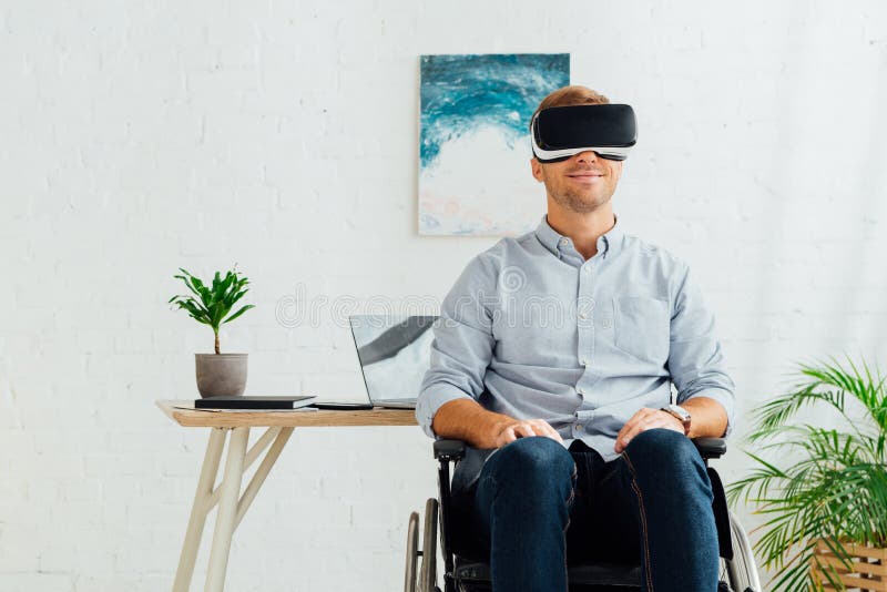 Disabled Man in Wheelchair Using Virtual Reality Headset in Living Room Stock Image Image of