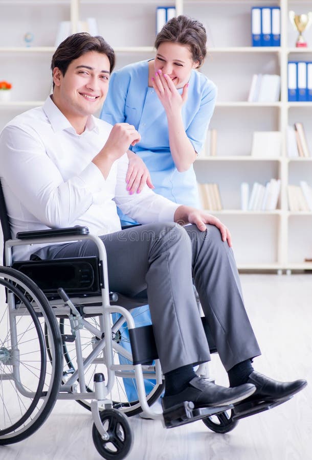 Disabled Patient on Wheelchair Visiting Doctor for Regular Check Stock ...