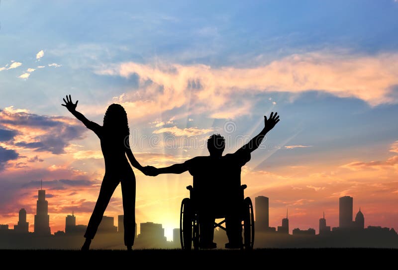 Disabled person in wheelchair with girlfriend on background of city stock image Disabled person in wheelchair with girlfriend on background of city stock image