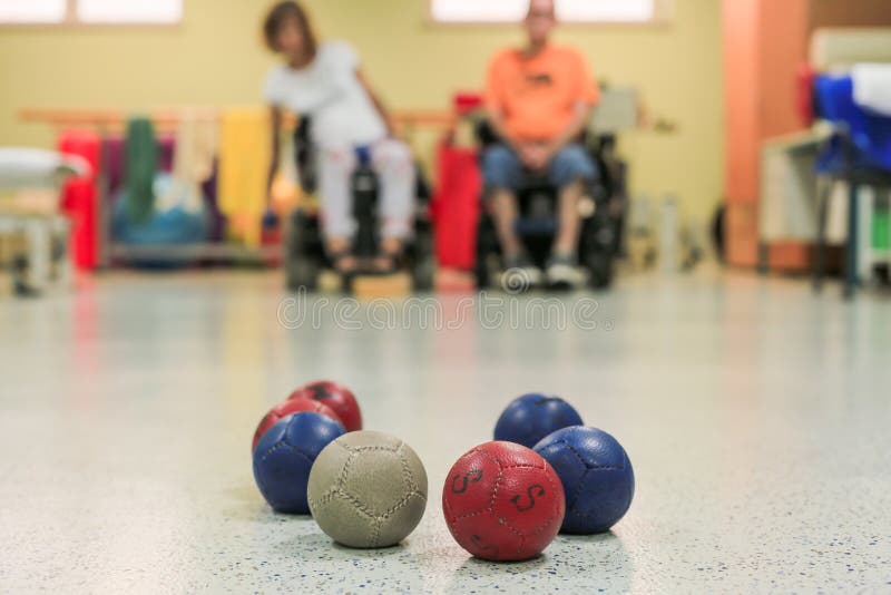 Disabled persons playing Boccia