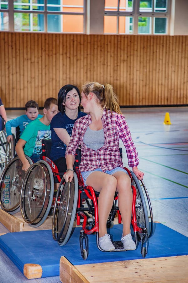 Disabled teenagers in wheelchair sports in the sports hall royalty free stock photos Disabled teenagers in wheelchair sports in the sports hall royalty free stock photos