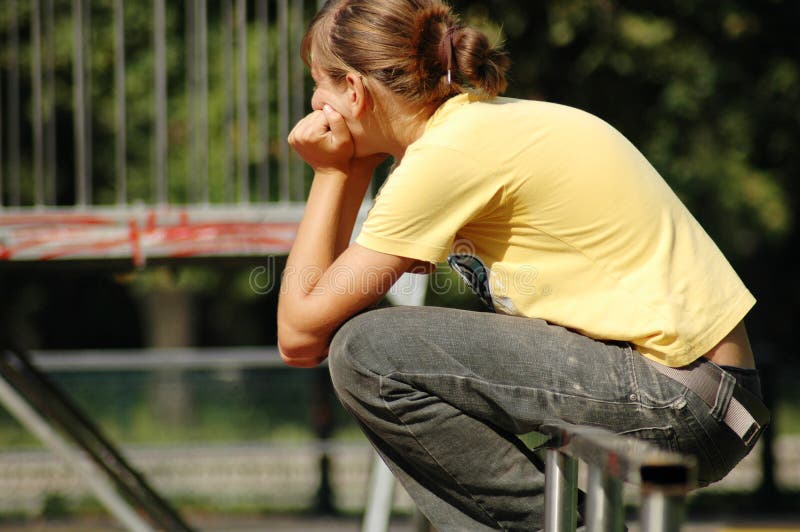 Disappointed skate girl in park