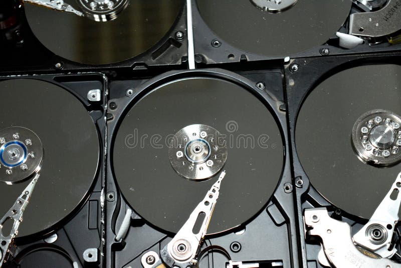 Disassembled Computer Hard Disk Drive Storage Memory with Platters, Spindle, Actuator and Read