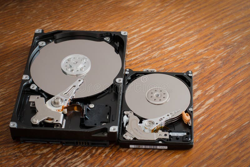 Disassembled Hard Drives on a Wooden Surface Stock Photo Image of connection, equipment 90083056