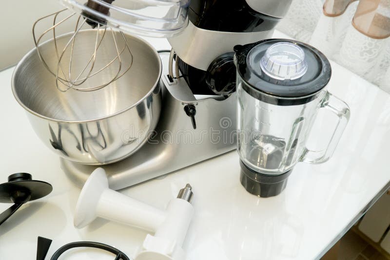 Disassembled Multifunctional Food Processor on Kitchen Countertops