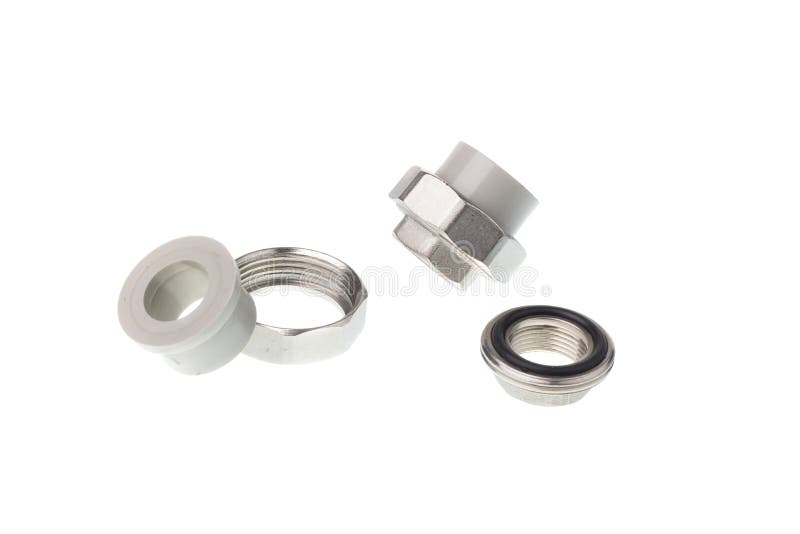 Disassembled plastic PPR straight metal thread coupling for water pipes, isolated on white background royalty free stock image