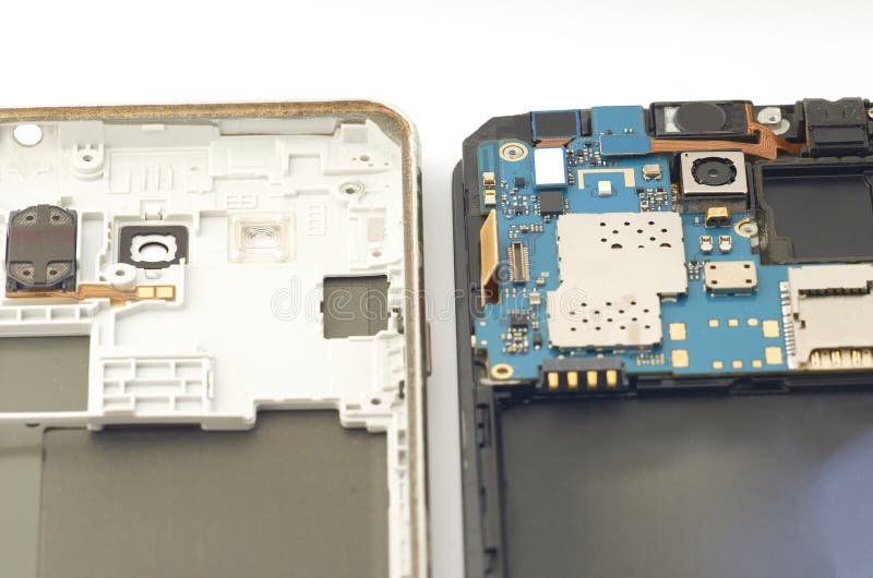 Disassembly of smartphone showing electrical board inside. The p stock photos