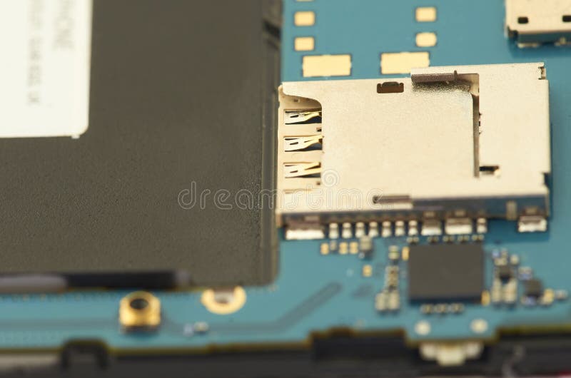 Disassembly of smartphone showing electrical board inside. The p royalty free stock photography