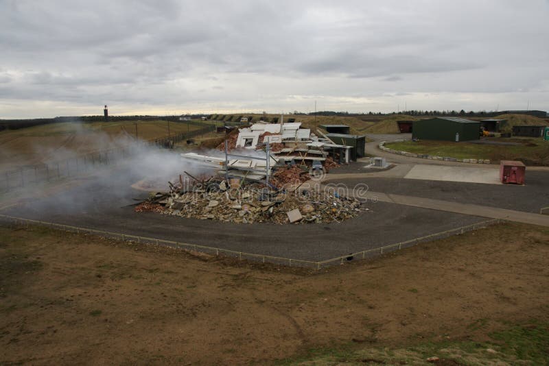 Building destroyed, explosion and collapses stock photos