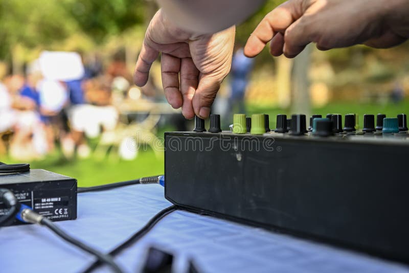 Disc Jockey, Mixing Music on the Digital Controller Table of a Sound