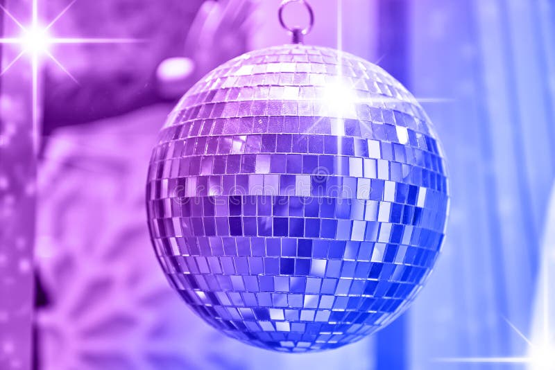 Disco Ball with Bright Rays of Lights, Party Background Stock Photo
