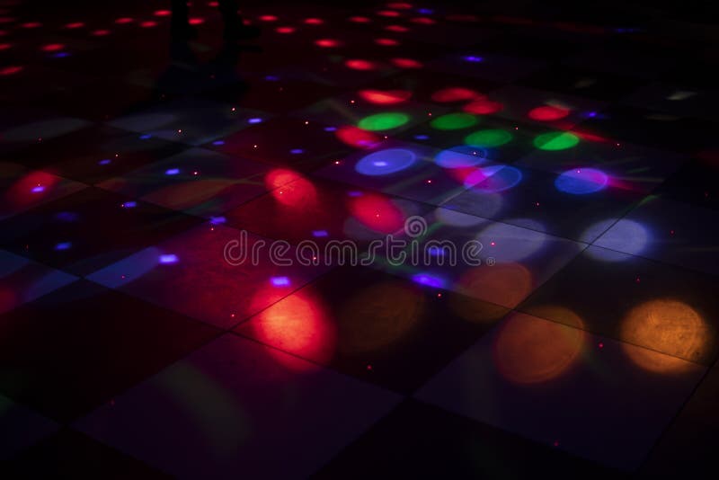 Disco Dance Floor. Light on Dance Floor. Colored Spots on Floor Stock