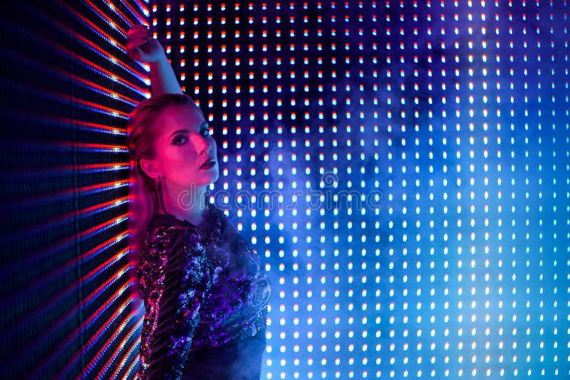 Disco Dancer in Neon Light in Night Club. Fashion Model Woman in Neon ...