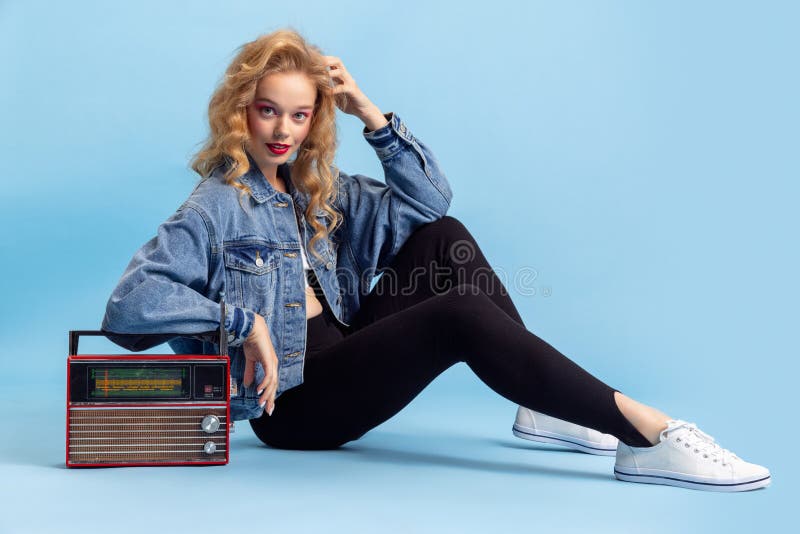 Portrait of Attractive Young Girl in Retro 90s Fashion Style, Outfits  Posing Isolated Over Blue Studio Background Stock Photo - Image of clothes,  glamor: 225069082