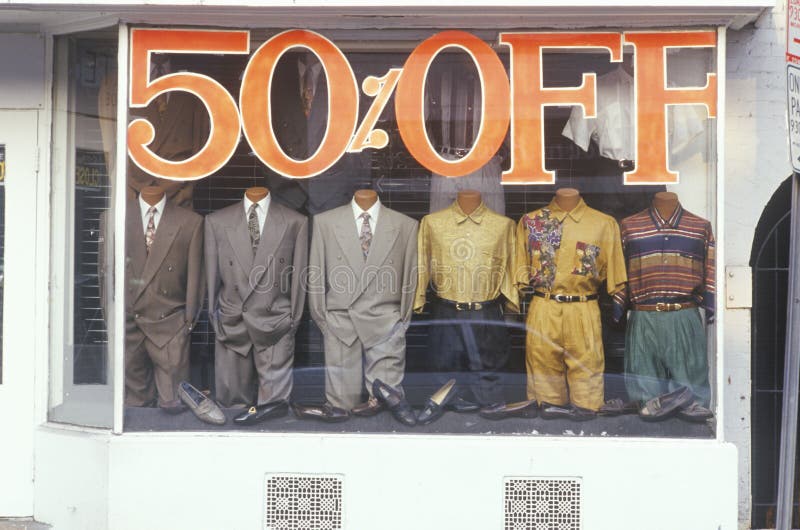 Discounted men s clothes in storefront window