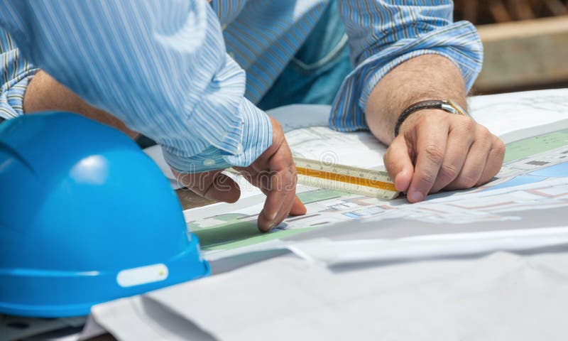 Discussing construction plans royalty free stock image