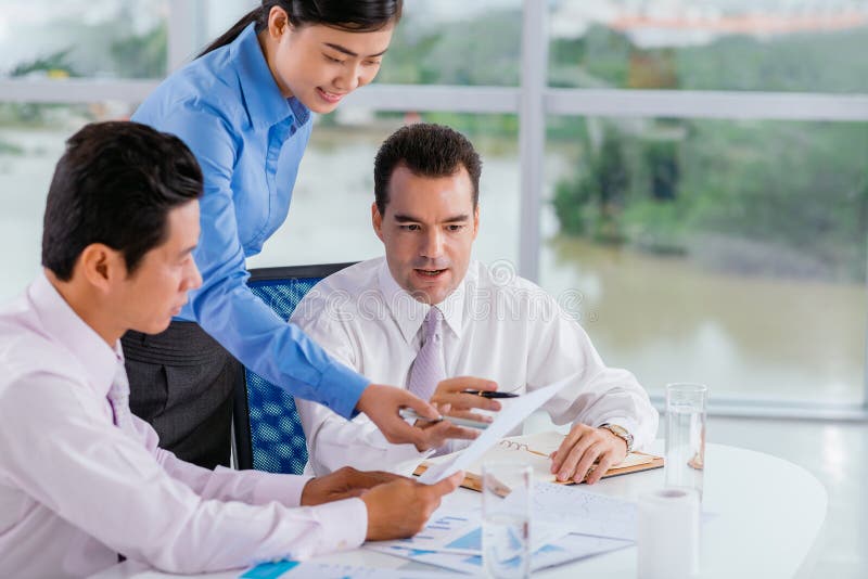 Discussing report stock images