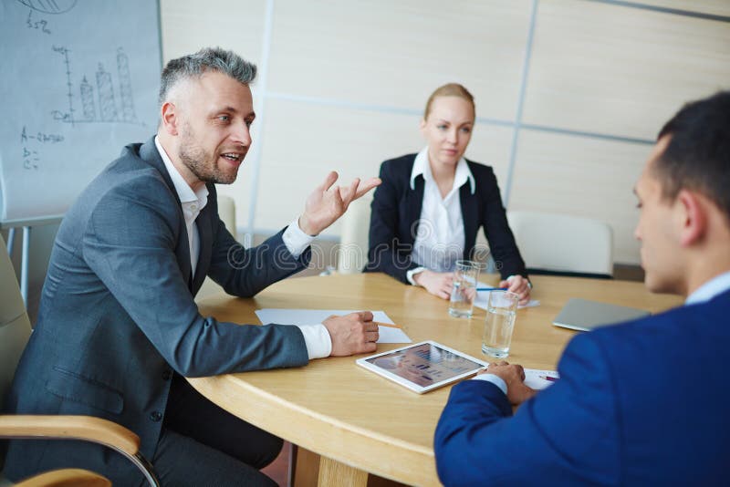 Discussion in office stock photo. Image of businesspeople - 75850170