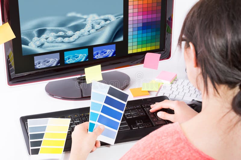 Graphic designer at work. Color swatch samples. Graphic designer at work. Color swatch samples.