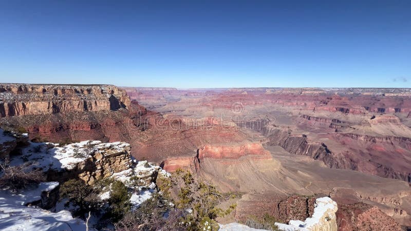 Disfrute de las impresionantes vistas del Gran Cañón en invierno para una aventura inolvidable almacen de video