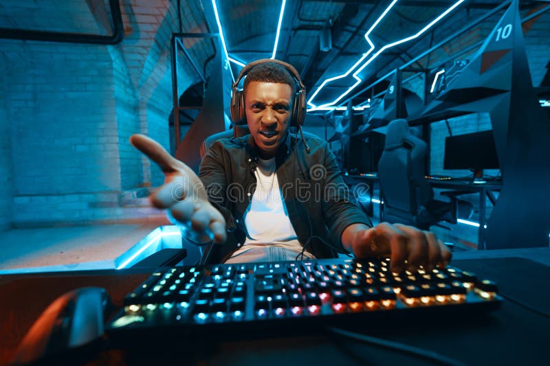 A disgruntled player points to a cheat in a PC game. royalty free stock photo