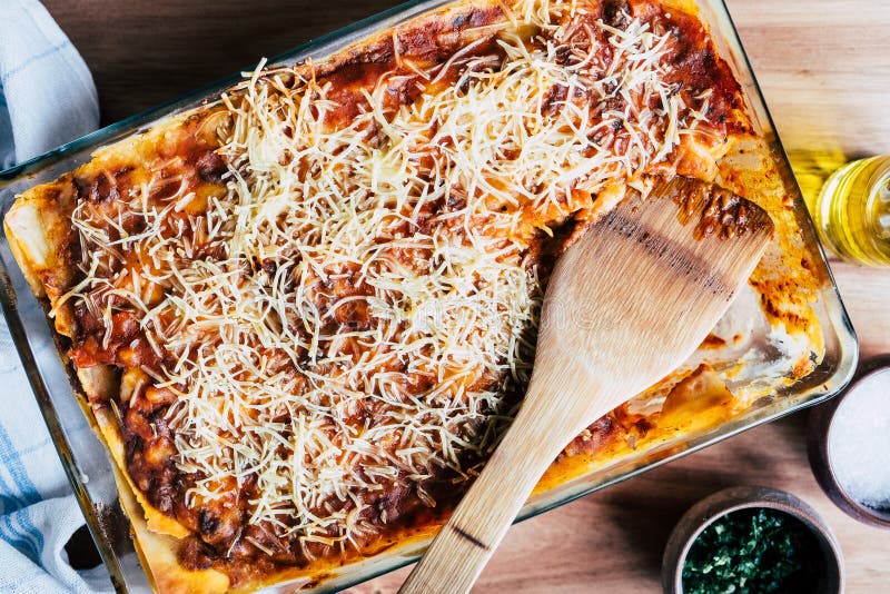 Dish of Bolognese Lasagna Gratin with Wooden Spoon To Serve Stock Image ...