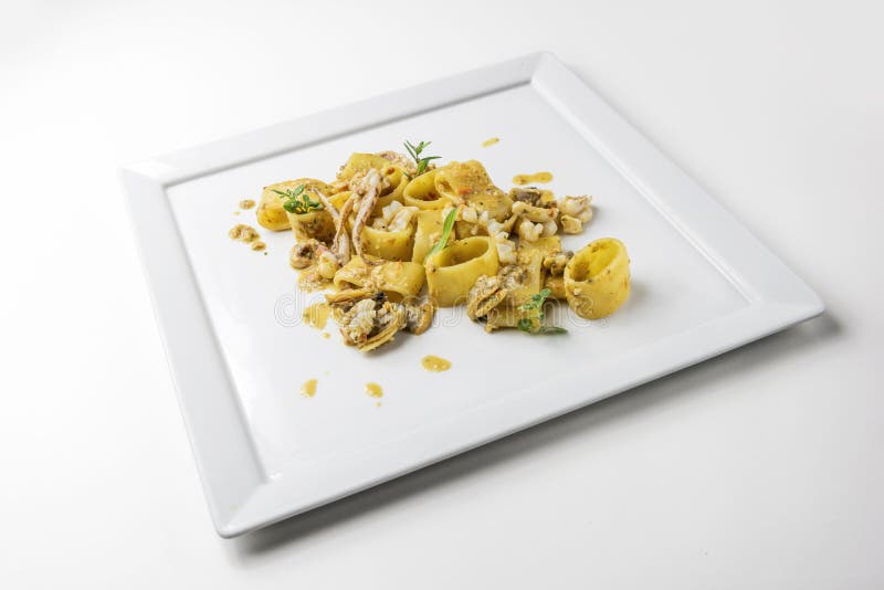 Dish of Calamarata Pasta with Squid and Clams Stock Image Image of