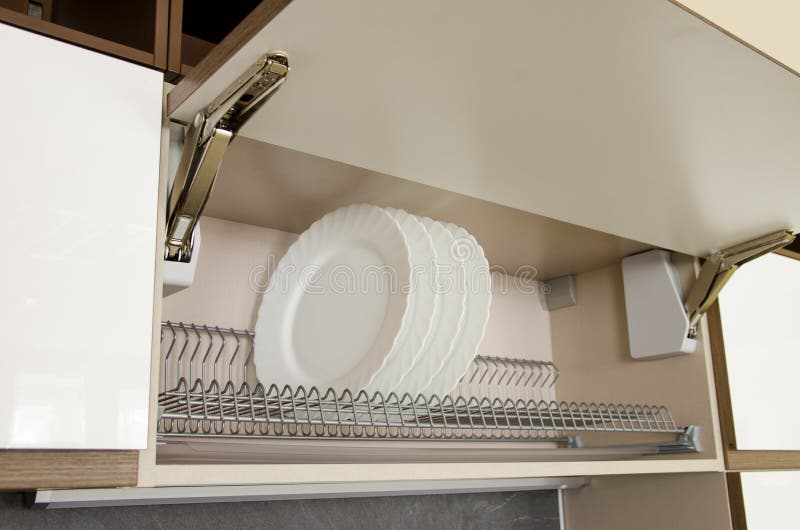 Dish Dryer Integrated in a Wall with a Door that Opens Upwards