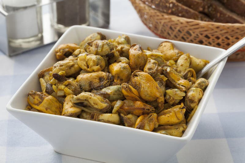 Dish with fresh baked mussels royalty free stock photos