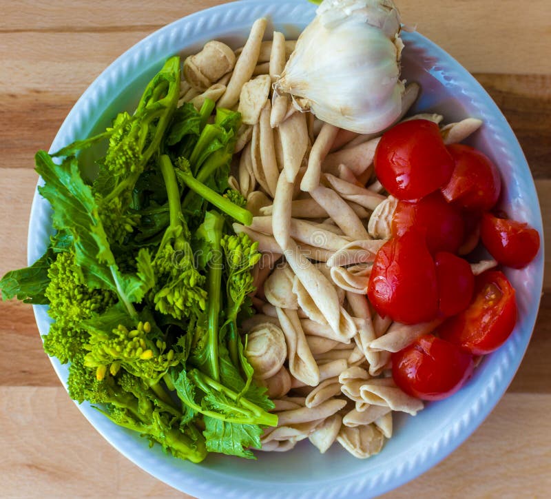 Orecchiette, tomatoes, garlic and turnip greens