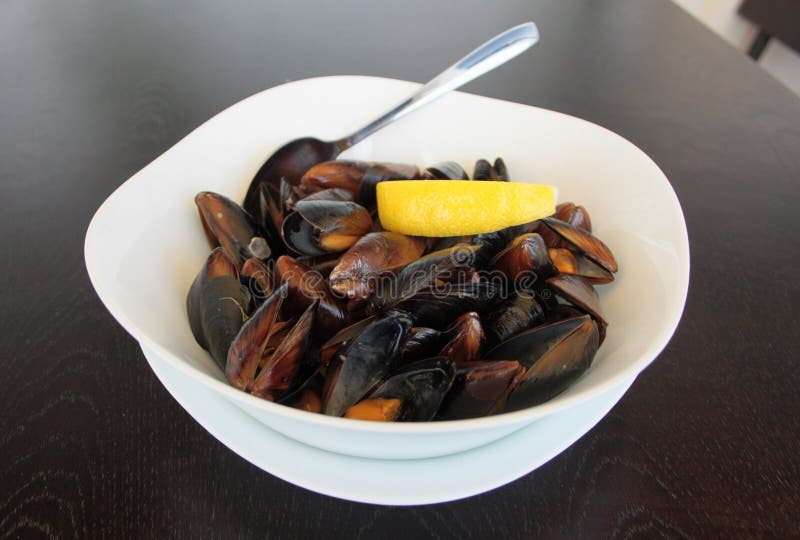 A of a dish of mussels stock photo. Image of summer, silver 74912172