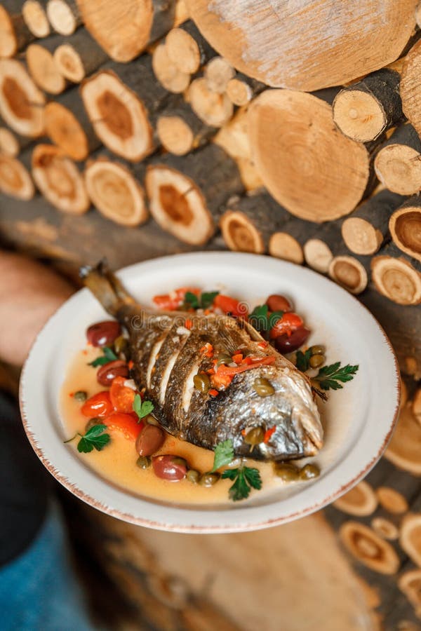 Dish Plate with Whole Fried Fish in a Restaurant Stock Photo Image of
