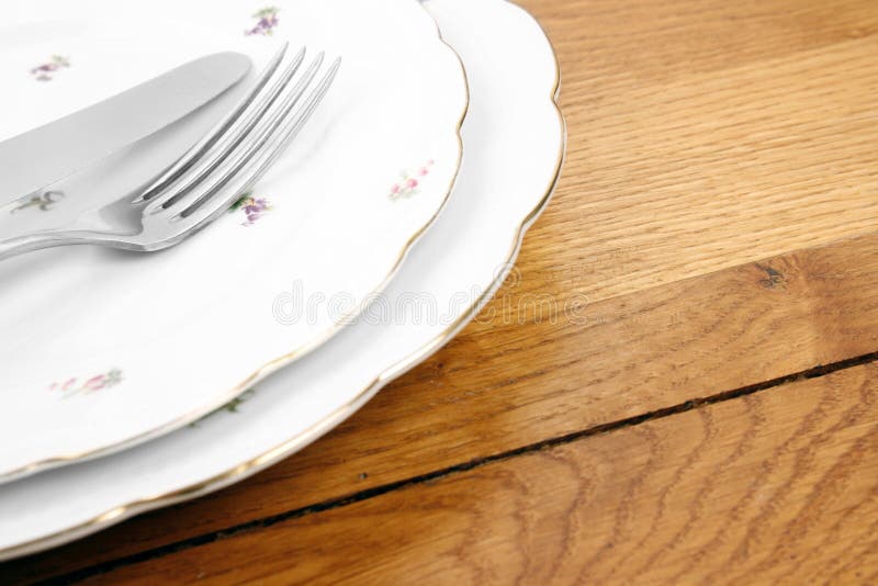 Dishes and cutlery set stock photo. Image of dishware 17328892