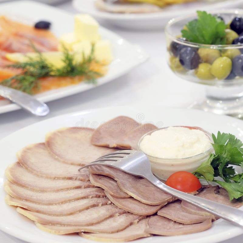 Dishes and food on the served table royalty free stock images