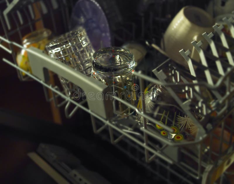Dishwasher full of dishes stock photo. Image of full 20859636