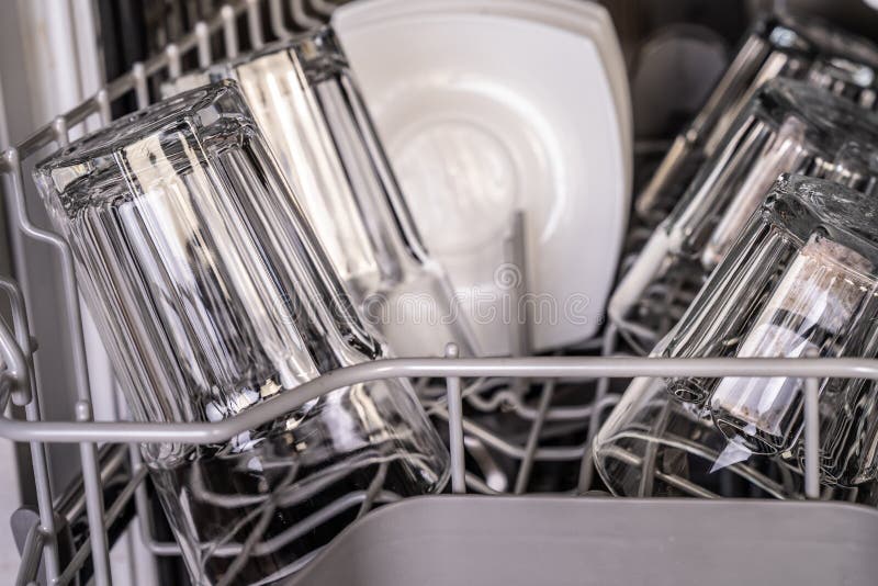 Clean transparent glass in dishwasher stock photo