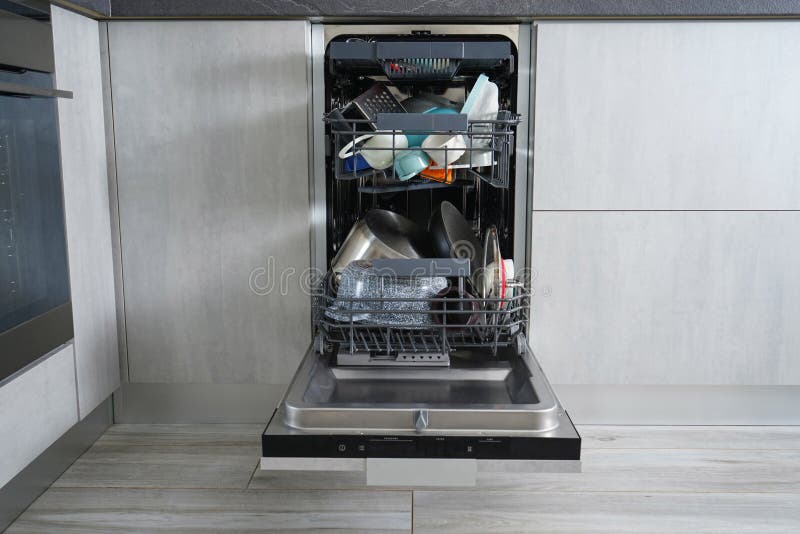 Dishwasher Machine, Open and Loaded with Dishes in the Kitchen, after