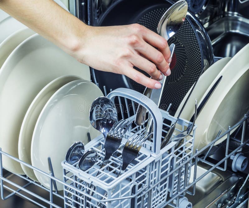 Dishwasher machine stock photo. Image of adult, young 82977154