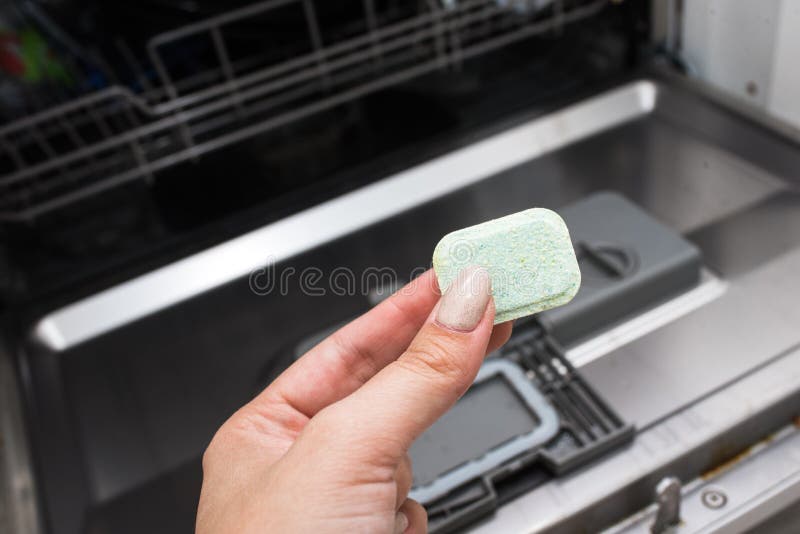 Dishwasher Tablet. Cleaning the Kitchen. Washing Dishes in the Dishwasher Stock Image Image of