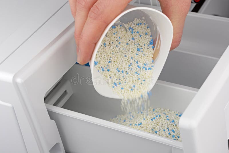 Dispense Washing Powder into the Washing Machine Stock Photo Image of large, action 169906314