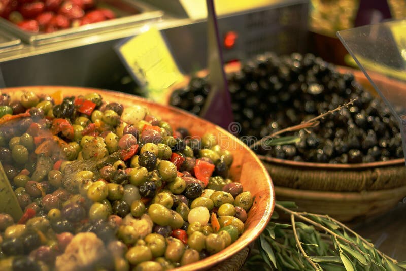 Cooked Olives with Olive Oil, White Wine and Fish Dish Stock Photo